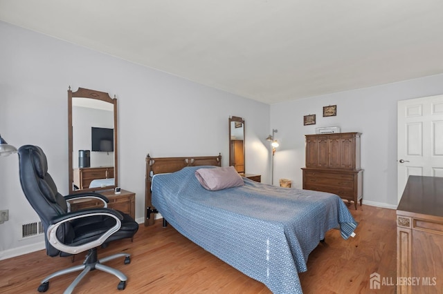 bedroom featuring light wood-type flooring