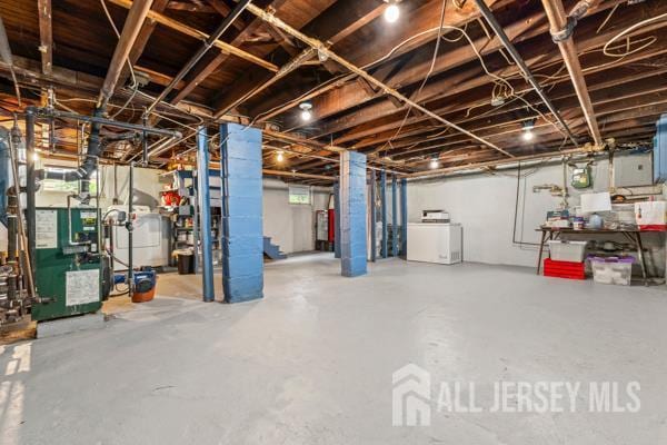 185 Rowland Pl, Woodbridge Proper, NJ 07095 - unfinished below grade area featuring washer / dryer