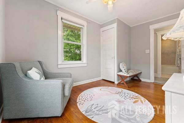 185 Rowland Pl, Woodbridge Proper, NJ 07095 - sitting room with ornamental molding, wood finished floors, and a ceiling fan