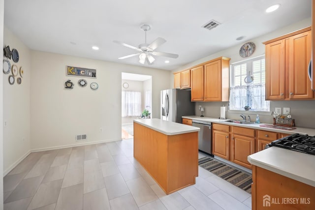 4 Holly Manor Ct, Helmetta, NJ 08828 - kitchen featuring stainless steel appliances, a kitchen island, light countertops, a ceiling fan, and recessed lighting