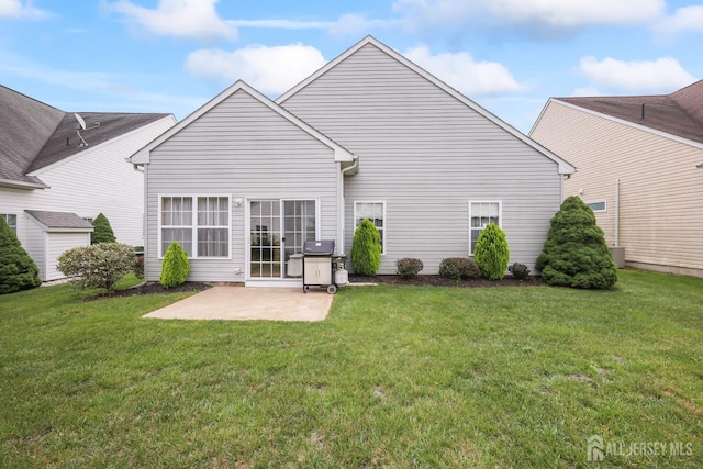 4 Holly Manor Ct, Helmetta, NJ 08828 - rear view of property featuring a patio and a yard