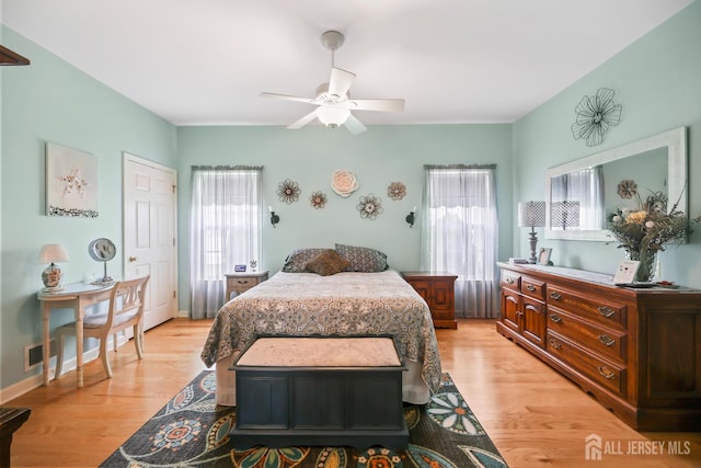 4 Holly Manor Ct, Helmetta, NJ 08828 - bedroom with light wood-type flooring and ceiling fan