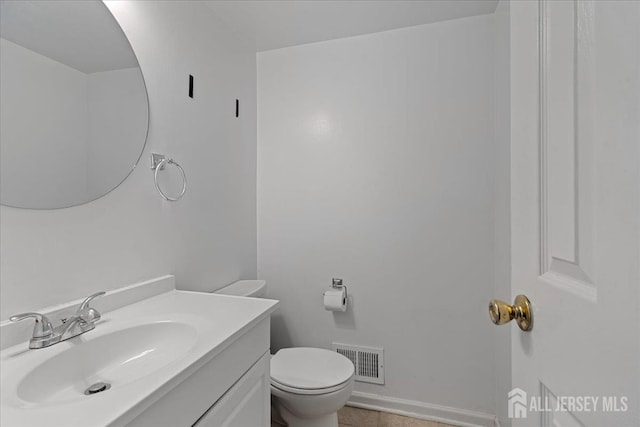 450 Saint Giles Ct, Franklin Twsp, NJ 08873 - bathroom featuring toilet, vanity, and baseboards
