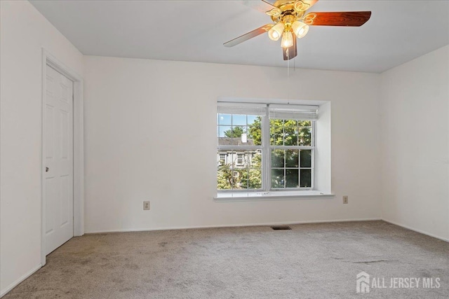 450 Saint Giles Ct, Franklin Twsp, NJ 08873 - carpeted spare room with ceiling fan and baseboards