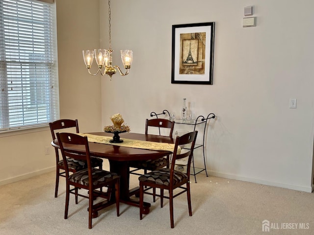 165 Einstein Way E, Windsor, NJ 08512 - dining area featuring baseboards, a chandelier, and light colored carpet