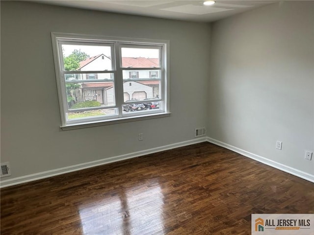 3205 Hana Rd, Edison, NJ 08817 - spare room with a ceiling fan and dark wood finished floors
