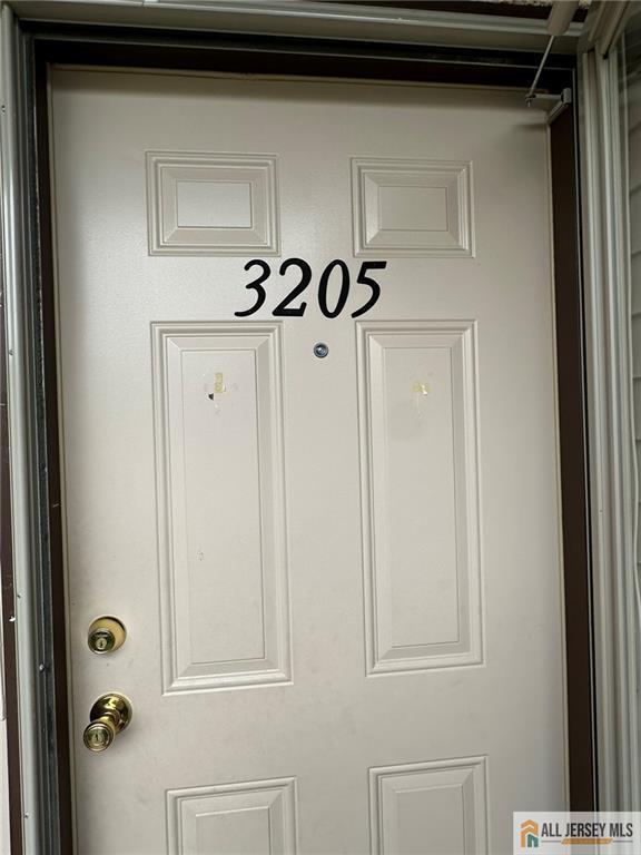 3205 Hana Rd, Edison, NJ 08817 - entrance to property featuring stucco siding