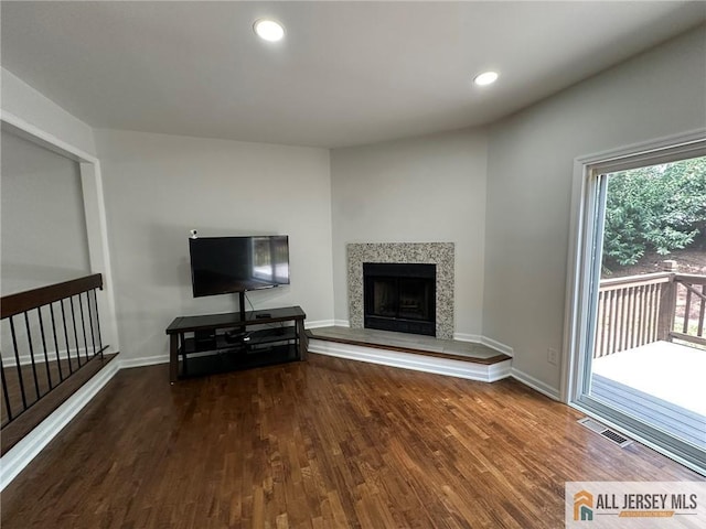 3205 Hana Rd, Edison, NJ 08817 - living area with wood finished floors, a fireplace with raised hearth, and recessed lighting