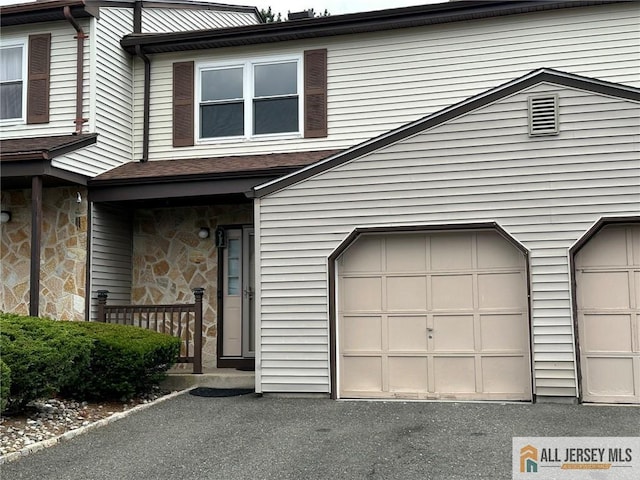 3205 Hana Rd, Edison, NJ 08817 - view of front of house featuring a garage