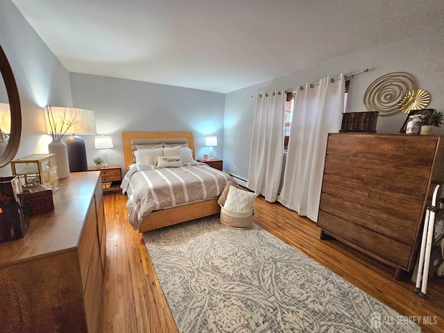 bedroom featuring hardwood / wood-style flooring