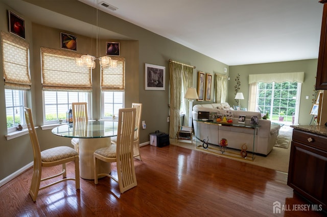263 Valencia Dr, Monroe, NJ 08831 - dining area featuring wood finished floors and a chandelier