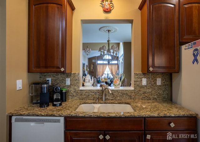 263 Valencia Dr, Monroe, NJ 08831 - kitchen with white appliances, a chandelier, tasteful backsplash, and stone countertops