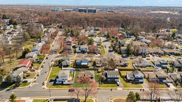 aerial overview of property's location with nearby suburban area
