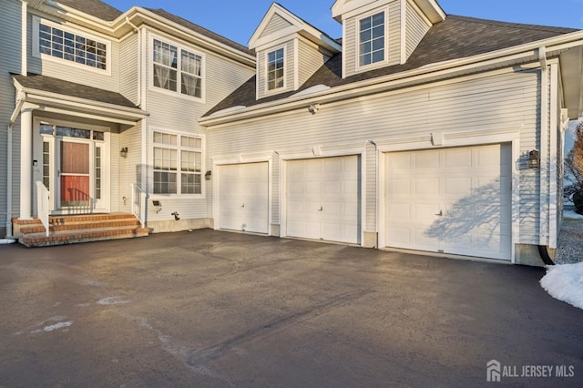 exterior space with a garage