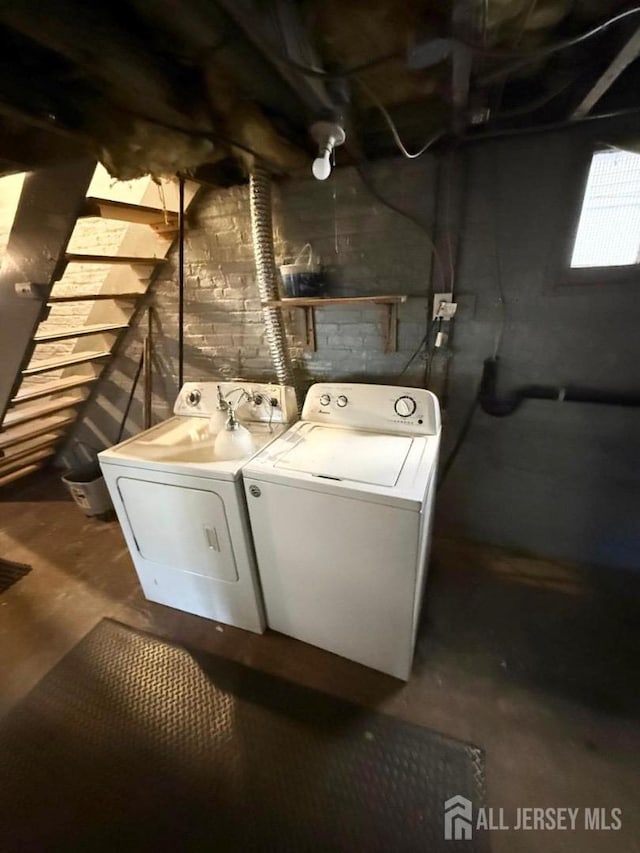 laundry area featuring washing machine and dryer