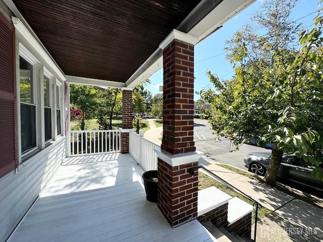 wooden deck with covered porch