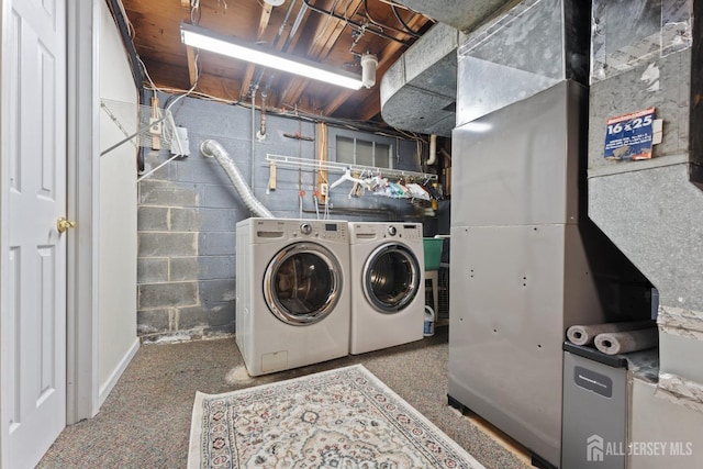 laundry area featuring laundry area and washer and dryer