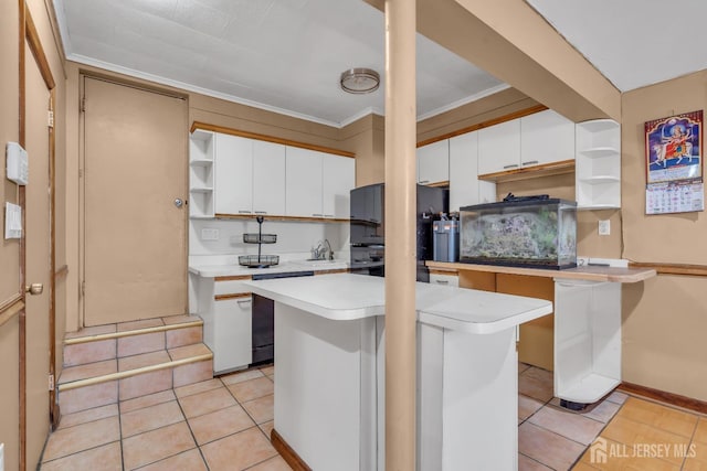 kitchen featuring light countertops, white cabinets, open shelves, and light tile patterned flooring