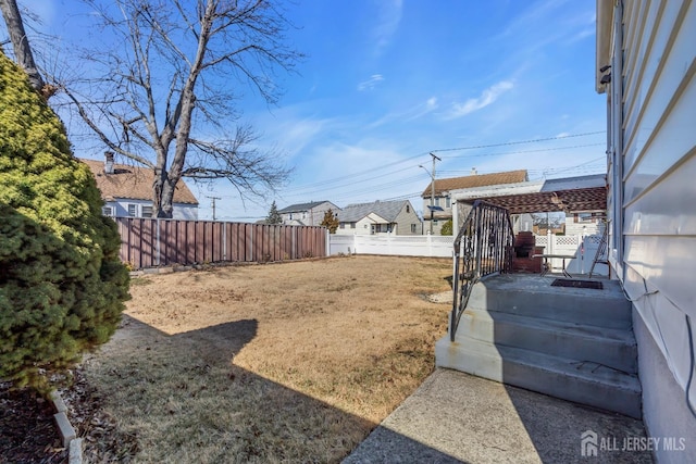 view of yard featuring fence