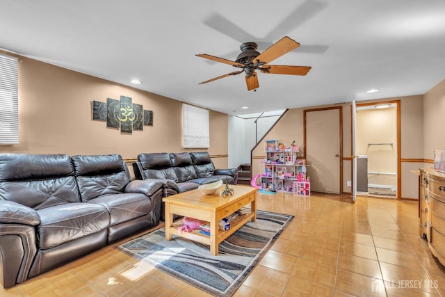 living room with recessed lighting, ceiling fan, and stairway