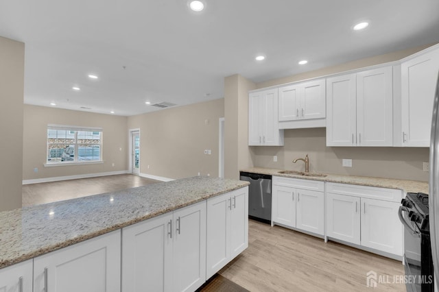 kitchen with sink, white cabinetry, black range with gas stovetop, dishwasher, and light stone countertops