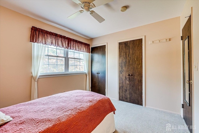 64 Annette Dr, Edison, NJ 08820 - carpeted bedroom featuring multiple closets and a ceiling fan