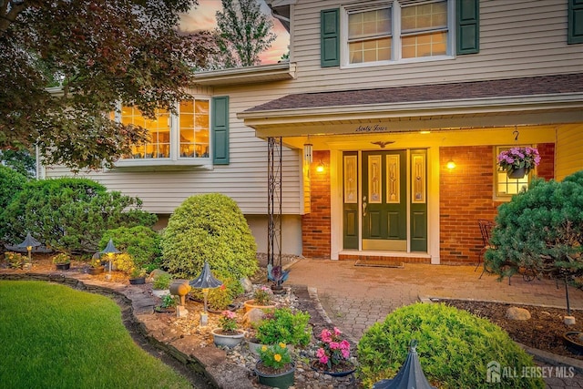 64 Annette Dr, Edison, NJ 08820 - property entrance featuring roof with shingles