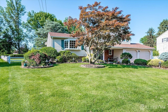 64 Annette Dr, Edison, NJ 08820 - view of front of property with a front yard and a garage