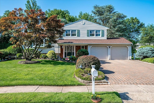 64 Annette Dr, Edison, NJ 08820 - split level home with decorative driveway, a front lawn, a shingled roof, and a garage