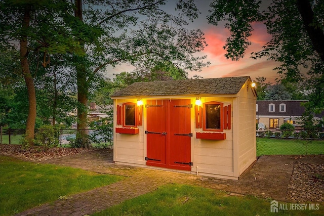 64 Annette Dr, Edison, NJ 08820 - outdoor structure at dusk with a shed