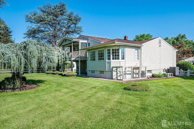 64 Annette Dr, Edison, NJ 08820 - rear view of property featuring a chimney