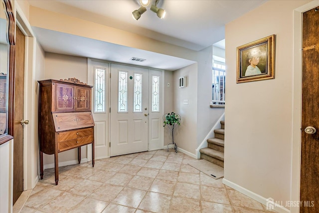 64 Annette Dr, Edison, NJ 08820 - foyer with baseboards and stairway