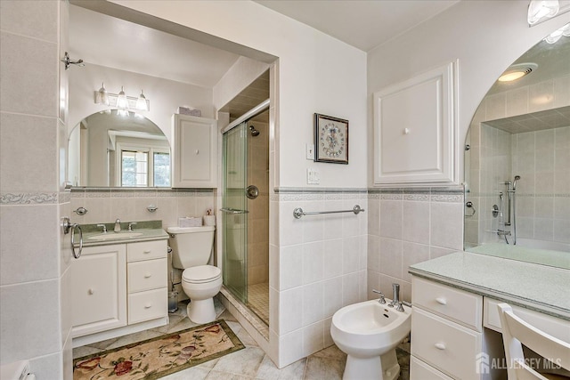 64 Annette Dr, Edison, NJ 08820 - full bathroom with tile walls, vanity, a shower stall, a bidet, and tile patterned flooring