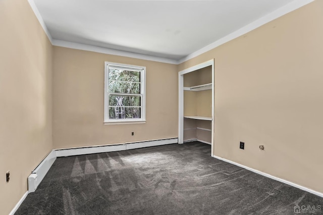 unfurnished bedroom with ornamental molding, dark carpet, and baseboard heating