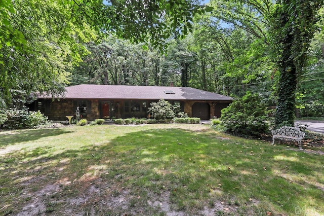 ranch-style house with a front lawn