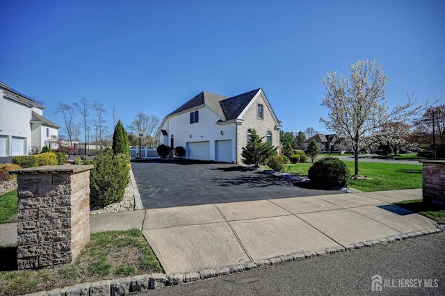 2 Eddie Ct, South Brunswick, NJ 08810 - view of asphalt driveway