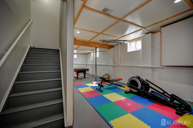 2 Eddie Ct, South Brunswick, NJ 08810 - exercise area with billiards and concrete block wall