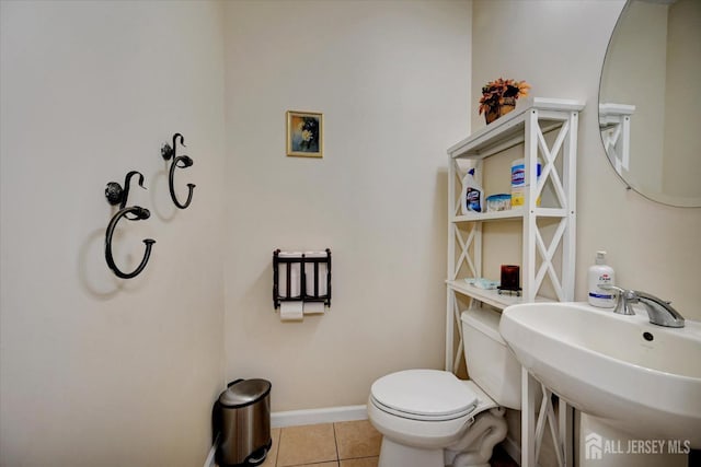 2 Eddie Ct, South Brunswick, NJ 08810 - half bath with tile patterned flooring, toilet, a sink, and baseboards