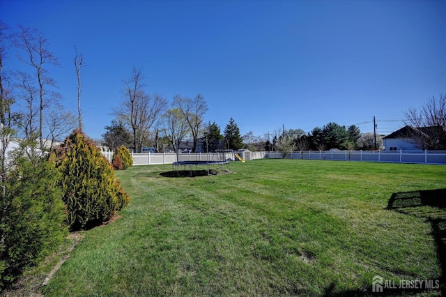 2 Eddie Ct, South Brunswick, NJ 08810 - view of yard featuring a trampoline