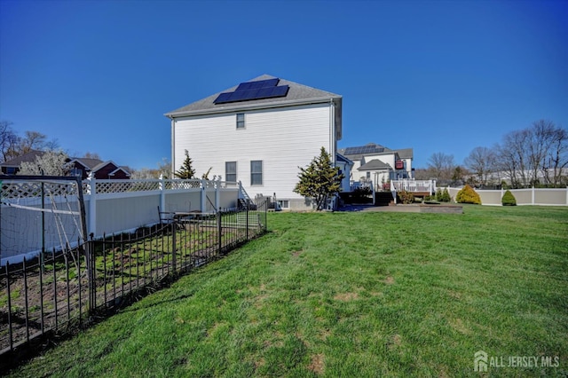 2 Eddie Ct, South Brunswick, NJ 08810 - rear view of property featuring roof mounted solar panels and a wooden deck