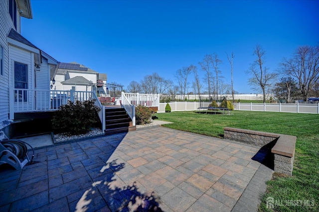 2 Eddie Ct, South Brunswick, NJ 08810 - view of patio with a trampoline and a wooden deck