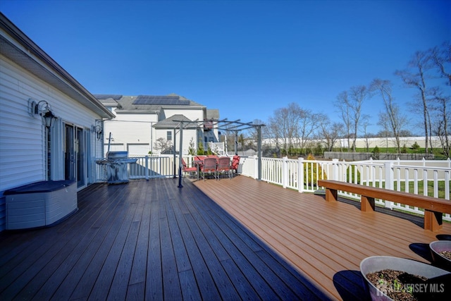 2 Eddie Ct, South Brunswick, NJ 08810 - wooden deck with outdoor dining space and a grill