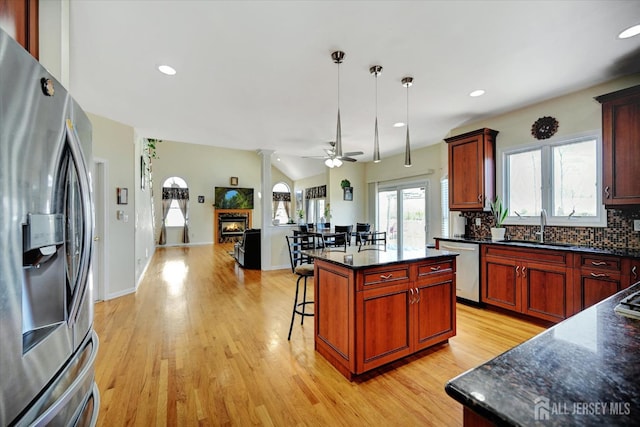 2 Eddie Ct, South Brunswick, NJ 08810 - kitchen featuring stainless steel appliances, a ceiling fan, light wood-style floors, a kitchen bar, and recessed lighting