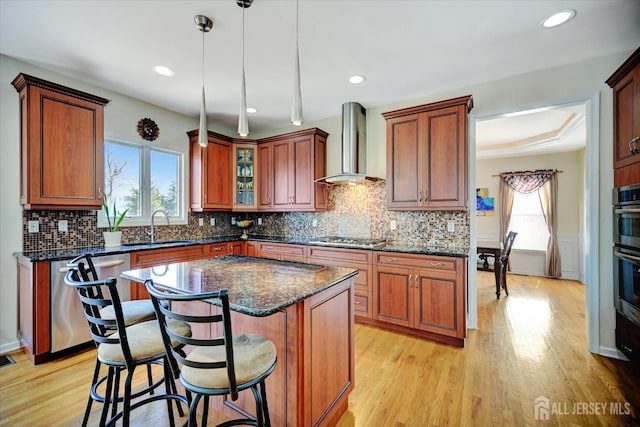 2 Eddie Ct, South Brunswick, NJ 08810 - kitchen with wall chimney range hood, a sink, stainless steel appliances, light wood-style floors, and recessed lighting
