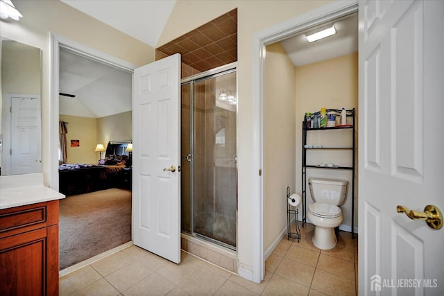 2 Eddie Ct, South Brunswick, NJ 08810 - ensuite bathroom with vanity, a stall shower, tile patterned flooring, lofted ceiling, and toilet