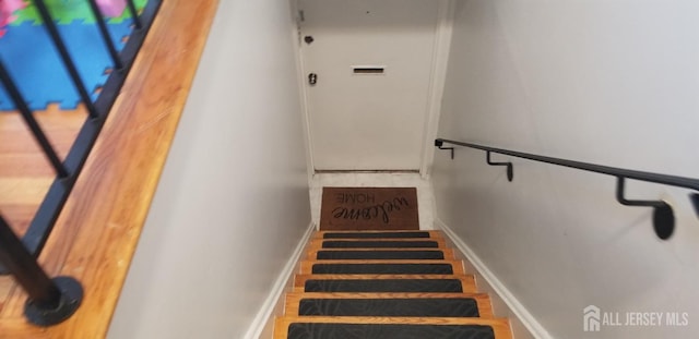 stairway with baseboards