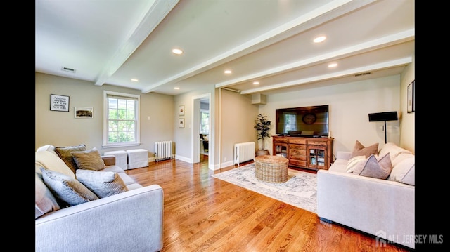 3 Mayfield Pl, Metuchen, NJ 08840 - living room featuring radiator, beamed ceiling, recessed lighting, and light wood-type flooring