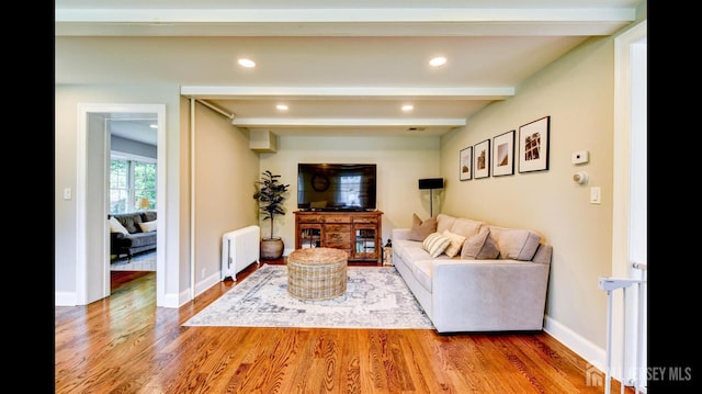 3 Mayfield Pl, Metuchen, NJ 08840 - living room featuring radiator, wood finished floors, beamed ceiling, and recessed lighting