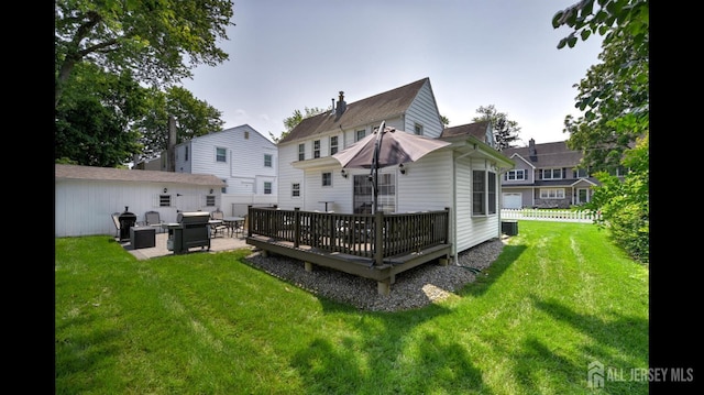 3 Mayfield Pl, Metuchen, NJ 08840 - rear view of house featuring outdoor lounge area, a wooden deck, and a lawn