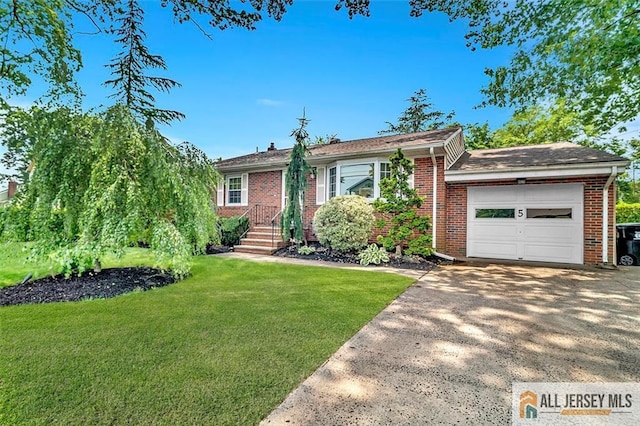 5 Serviss Ave, East Brunswick, NJ 08816 - view of front of home featuring driveway, a garage, a front lawn, and brick siding